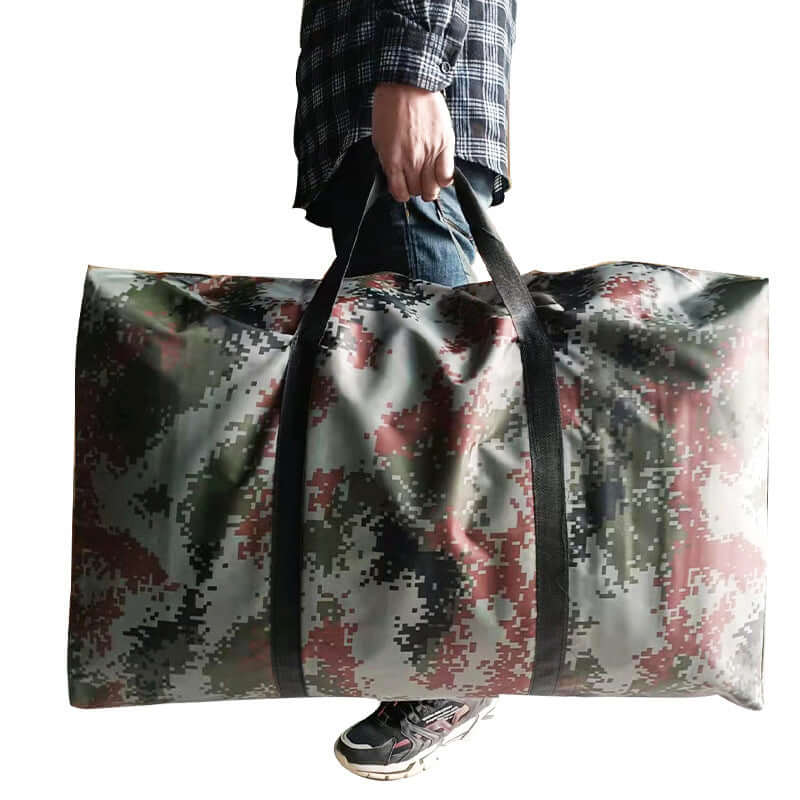 100L large foldable travel duffel bag in camouflage design, ideal for trips and storage, held by a person.