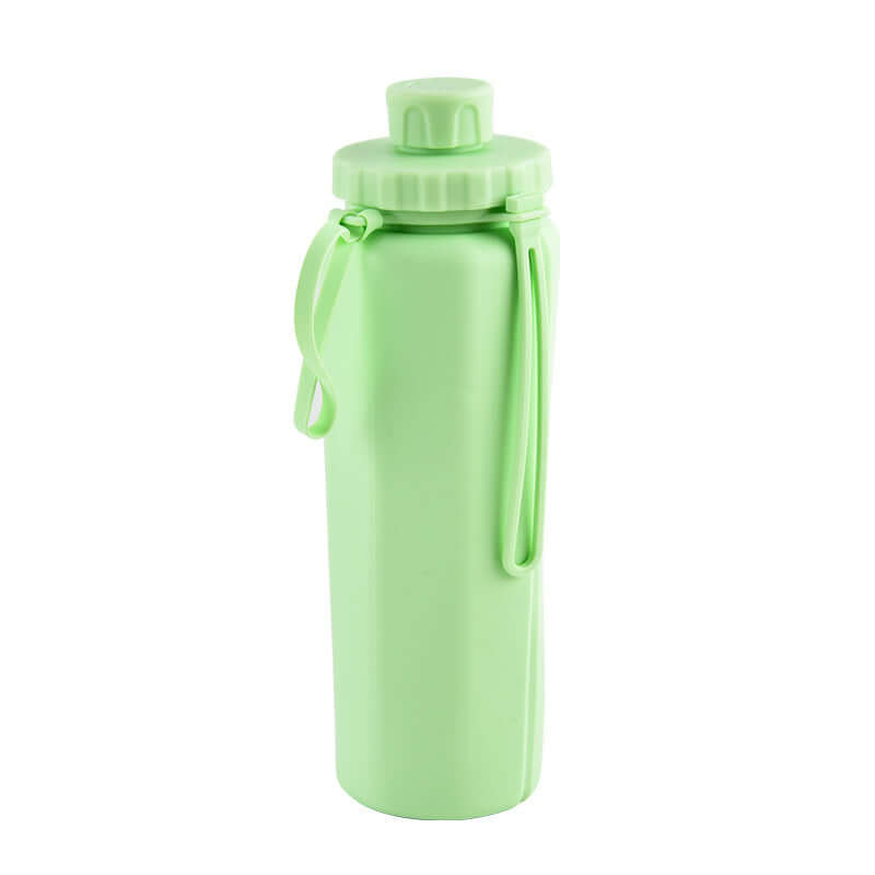 Foldable travel water bottle in green, lightweight and durable for hydration on the go.