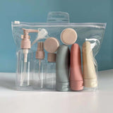 Reusable travel toiletry bottle set in a clear bag, perfect for lotions and cosmetics, ideal for travelers.